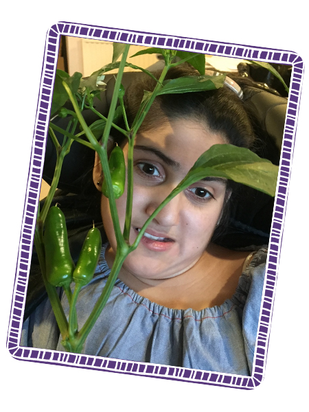 Rhea with her homegrown chilli plant!