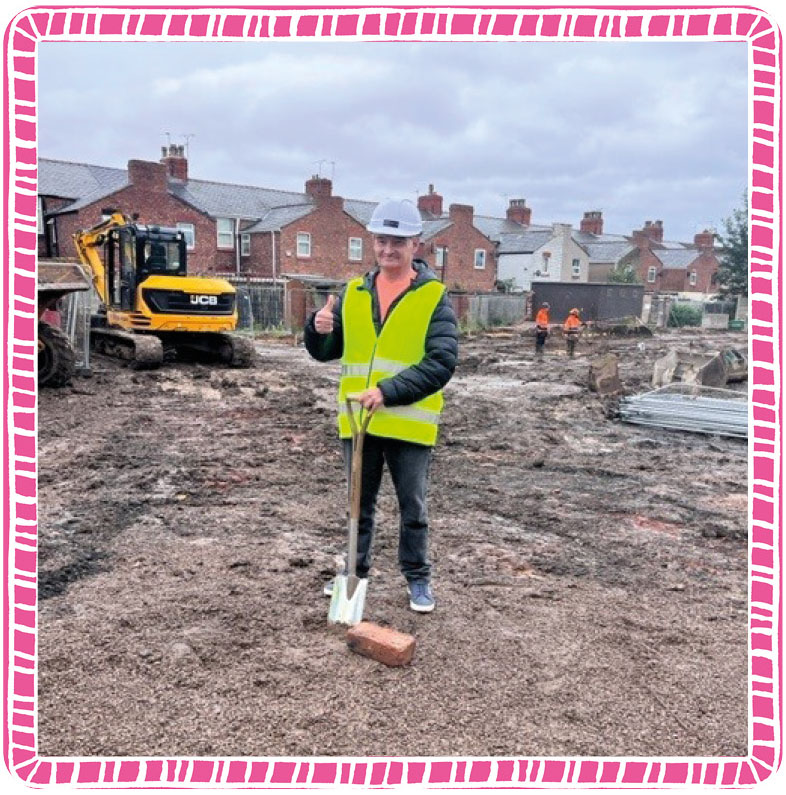 A picture of Simon, a person we support, breaking ground at our new site, Ellesmere Port.